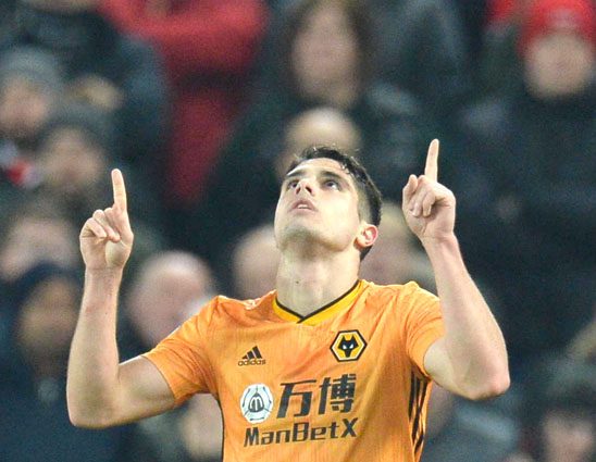epa08094142 Wolverhampton's Pedro Neto (R) celebrates scoring a later disallowed goal by the VAR during the English Premier league soccer match between Liverpool and Wolverhampton Wanderers held at Anfield in Liverpool, Britain, 29 December 2019. EPA/PETER POWELL EDITORIAL USE ONLY. No use with unauthorized audio, video, data, fixture lists, club/league logos or 'live' services. Online in-match use limited to 120 images, no video emulation. No use in betting, games or single club/league/player publications